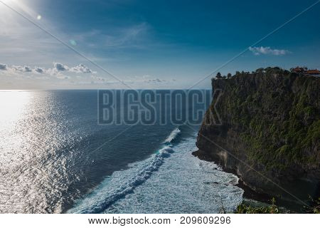 Famous Uluwatu temple in Bali, Indonesia. Sunset