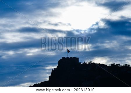 Silhouette of Ankara Castle in a dramatic cloudy sky - Ankara, Turkey