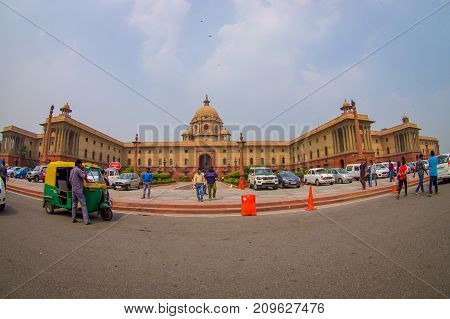 Jaipur, India - September 26, 2017: Beautiful goverment building of Rashtrapati Bhavan is the official home of the President of India, with some richshaw parked at outdoor, fish eye effect.