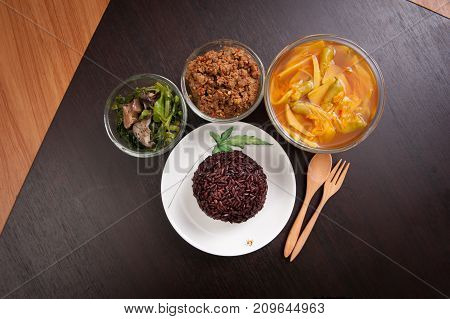 Vegetarian Food Thai-style With Stir-fried Vegetables Spinac And Shiitake Riceberry Rice Tamarind Pa