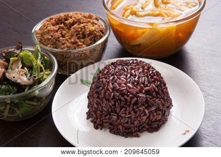 Vegetarian Food Thai-style With Stir-fried Vegetables Spinac And Shiitake Riceberry Rice Tamarind Pa