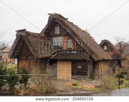 Traditional and Historical Japanese village Shirakawago Japan - December 22 2016 : The view of Traditional Japanese village Shirakawago in autumn season The unique farmhouse called "Gassho" is world heritage of Japan