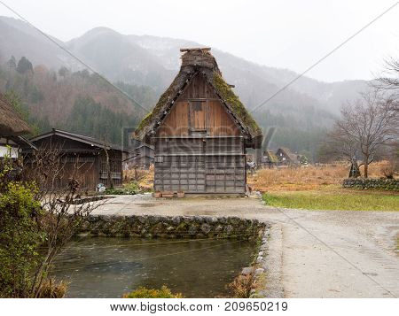 Traditional and Historical Japanese village Shirakawago Japan - December 22 2016 : The view of Traditional Japanese village Shirakawago in autumn season The unique farmhouse called "Gassho" is world heritage of Japan