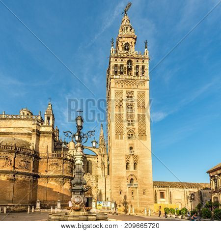 SEVILLA,SPAIN - OCTOBER 1,2017 - View at the Giralda tower of Sevilla cathedral. Sevilla is situated on the plain of the river Guadalquivir.