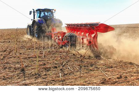 Work Of A Powerful Tractor In Field Cultivation And Cultivation. Agronomy