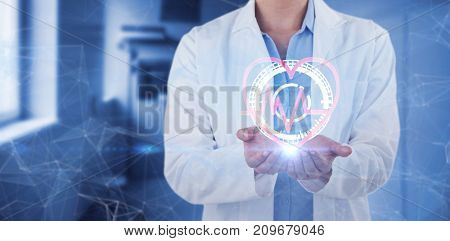 Midsection of female doctor standing with hands cupped against vacant corridor