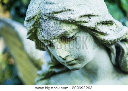 angel of death as a symbol of the end of life. Ancient statue. (Religion eternal life immortality faith concept)