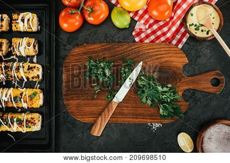 Knife And Dill On Cutting Board