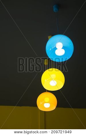 Colorful of modern lamp hanging on the ceiling for decoration