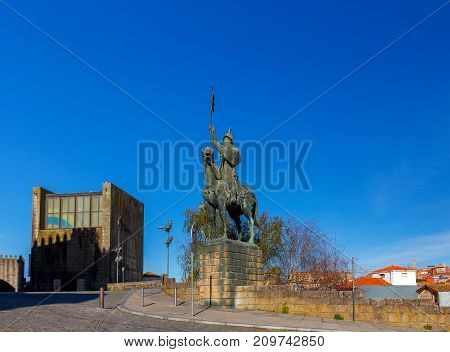 Equestrian statue of Vimara Perez in the historical center against the blue sky. Porto. Portugal.