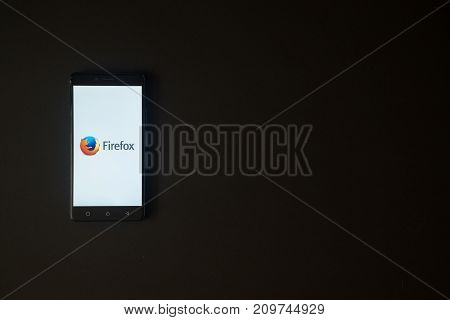 Los Angeles, USA, october 19, 2017: Mozilla firefox logo on smartphone screen on black background.