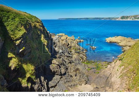 View of the sea and the Devon coast. View from steep bank Burgh Island. UK