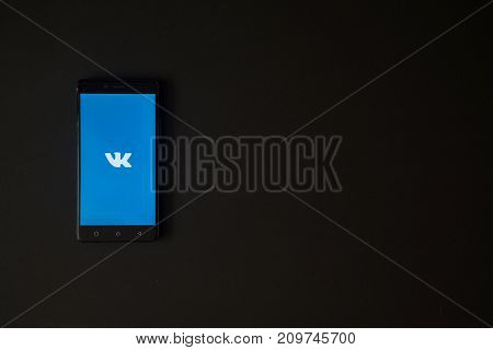 Los Angeles, USA, october 19, 2017: Vkontakte logo on smartphone screen on black background.