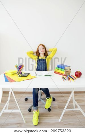 Smart girl is sudying and doing her homework