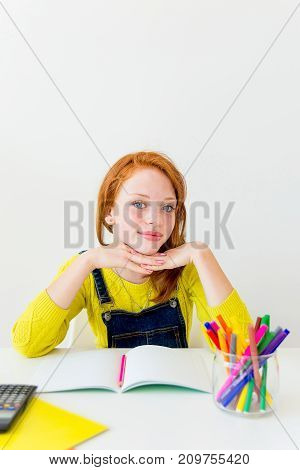 Smart girl is sudying and doing her homework