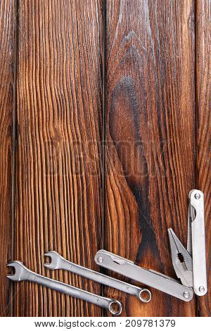 Cool set of old hand tools on wooden table