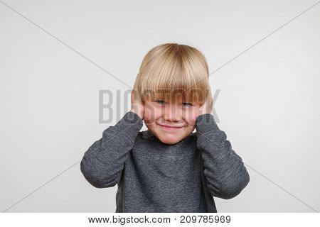 Cute horisontal photo of handsome happy child