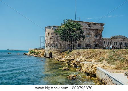 Old damaged by war fort in the Black Sea coast. Coastal Michael's fortress in Sevastopol, Crimea
