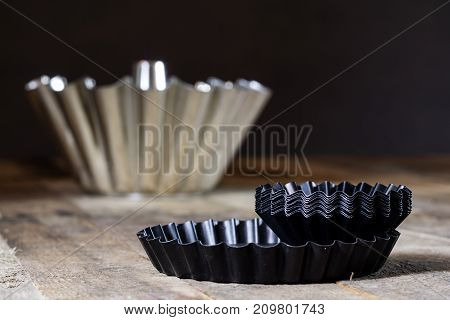 Old Baking Molds On An Old Kitchen Table. Baking Accessories In The Kitchen.