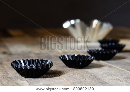 Old Baking Molds On An Old Kitchen Table. Baking Accessories In The Kitchen.