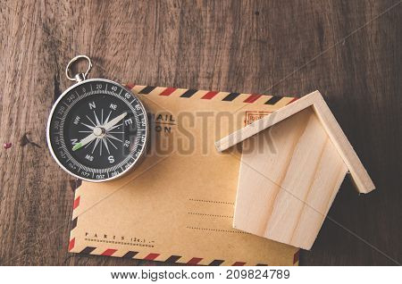 Vintage compass on the very old paper or letter envolop