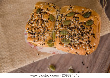 fresh bread and wheat on the wooden