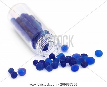 Silica gel used as water absorbent over white background