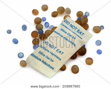 Silica gel used as water absorbent over white background