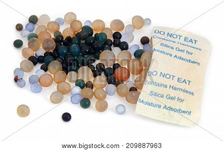 Silica gel used as absorbent of moisture over white background