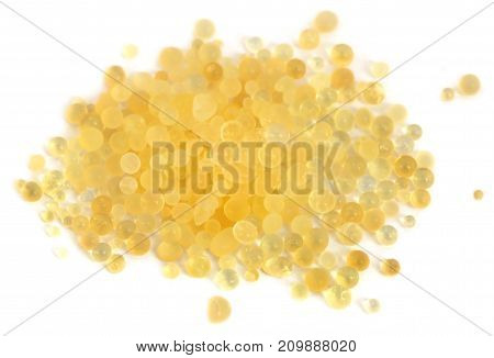 Silica gel used as water absorbent over white background