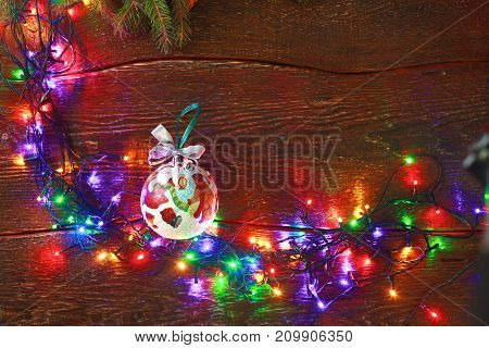 Christmas rustic background - vintage planked wood with lights and free text space.
