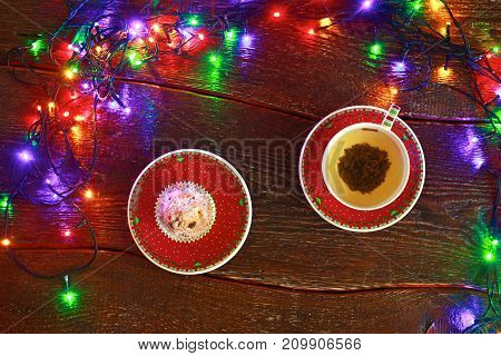 Christmas rustic background - vintage planked wood with lights and free text space.