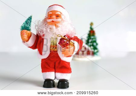 santa claus standing in front of white background.
