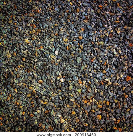 Small details of mixing color stones wall paper background.