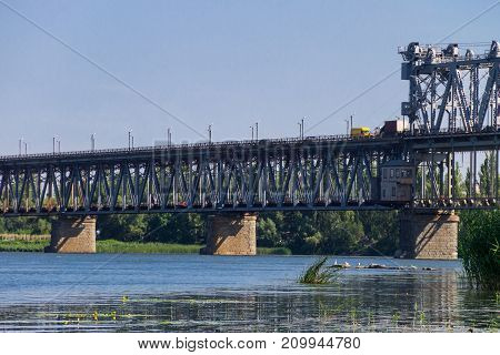 Bridge with traffic over the Dnieper river in Kremenchug Ukraine