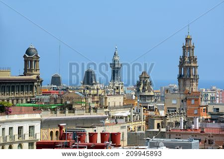 Barcelona Old City skyline with tower of Edifici de Correus in the Old City (Ciutat Vella) of Barcelona, Catalonia, Spain. Photo taken from the top of the Barcelona Cathedral.