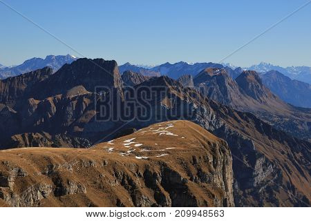 Autumn day in the Swiss Alps. View from mount Chaeserrugg.