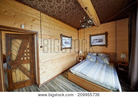 PERESLAVL ZALESSKY, RUSSIA - AUG 28, 2017: Interior of bedroom with double bed in guest house of tourist complex Botik at Plescheevo lake shore, near Museum Botik of Peter the Great.