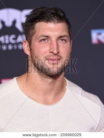 LOS ANGELES - OCT 10:  Tim Tebow arrives for the 