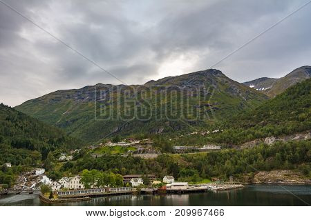 Hellesylt is a small village in Stranda Municipality Norway. The village lies at the head of the Sunnylvsfjorden which is a branch of the Storfjorden and which the more famous Geirangerfjorden in turn branches off nearby.