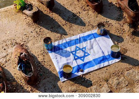 Budapest, Hungary Shoes In The Danube Memorial, Commemorating Innocent Jews Shot Flag Of Israel