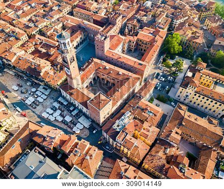 Torre Dei Lamberti Aerial Panoramic View. Torre Lamberti Is Tower In Piazza Delle Erbe Square In Ver