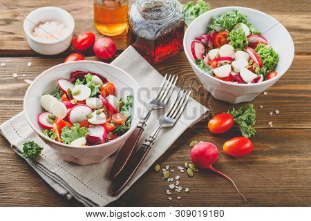 Salad From Iceberg Lettuce, Kale And Radiccio, Cherry Tomatoes, Radish, Mini Mozzarella And Pumpkin 