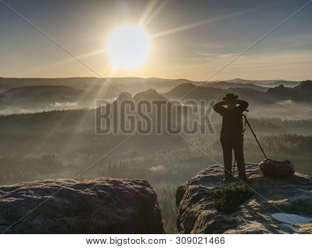 Girl Frind Photographer Artist Working On The Edge. View Point On High Mountain Peak With Circle Vie