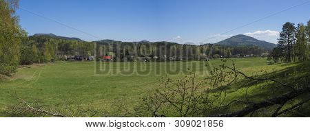 Panoramic Landscape With View On Village Marenice In Lusitian Mountains With Traditional Wooden Cott