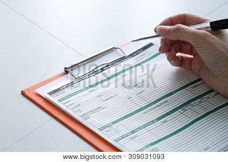 Seeking Job Concept, Filling Up The Information In An Employment Application Form