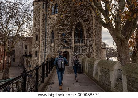 London, England, December 10th, 2018: People Walking Across The Tower Of London In Direction To Lant