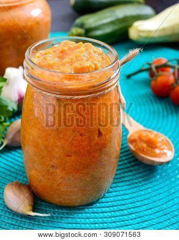Delicious Squash Caviar In A Jar On The Table. Homemade Caviar With Zucchini, Garlic, Carrots, Tomat