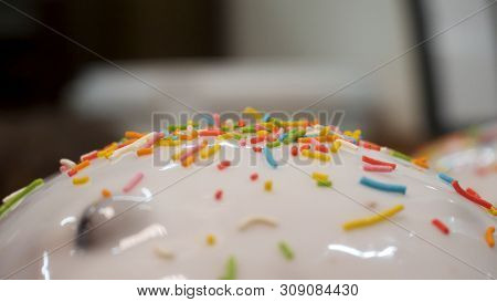 Close Up For Home Made Easter Cake With White Glaze And Colorful Sweet Confetti, Orthodox Holiday An