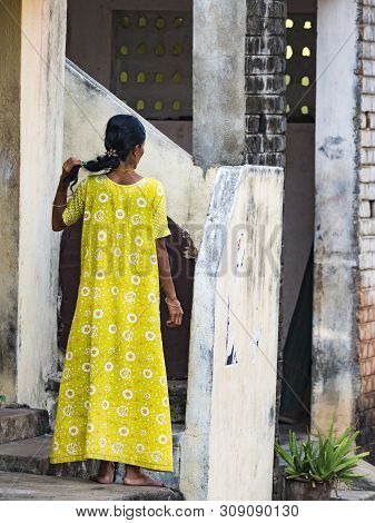 Puduchery, India - December Circa, 2018. Unidentified Young And Elegant Woman In Indian Yellow Sari 